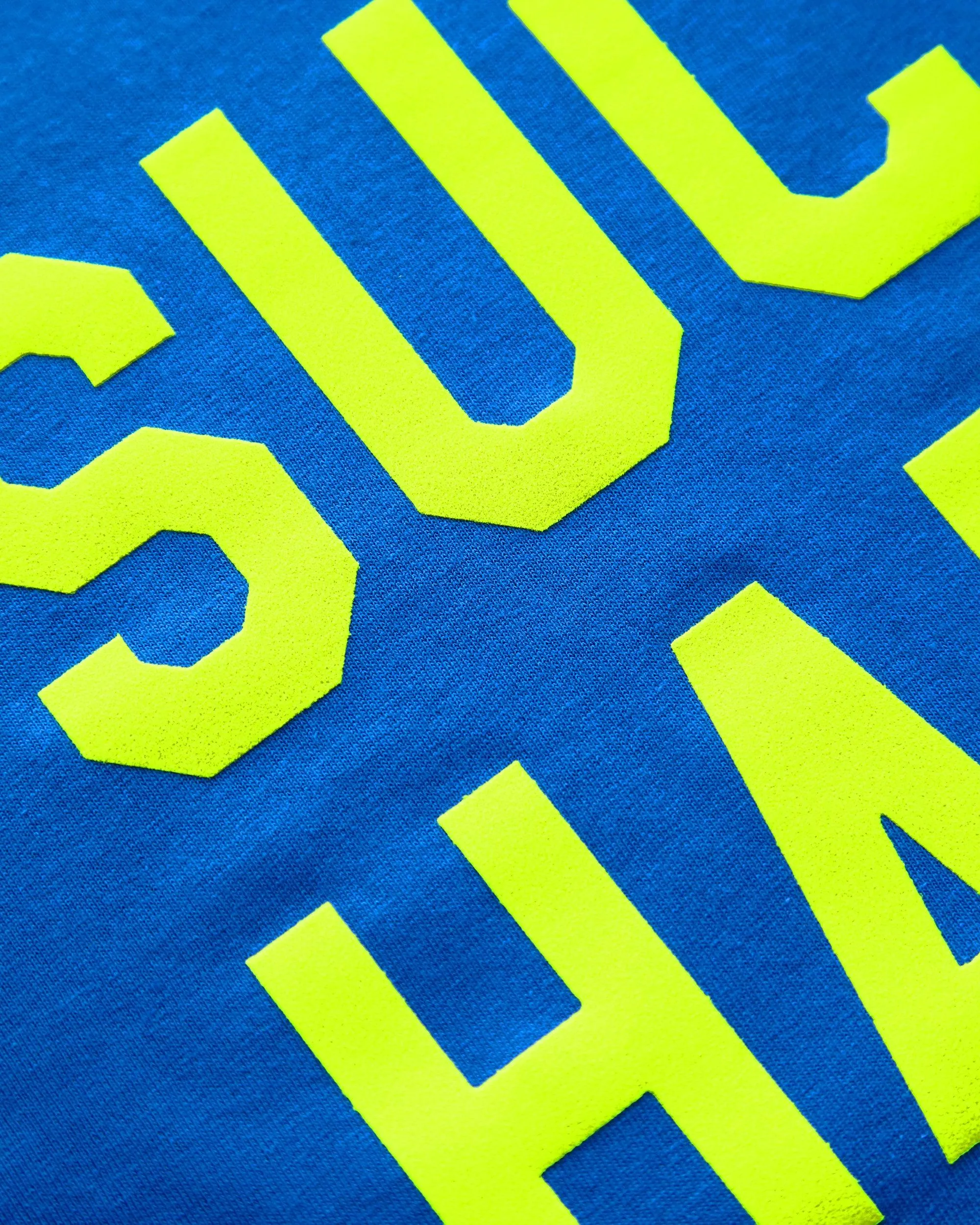 Fluorescent yellow flock suck hard - blue crop top